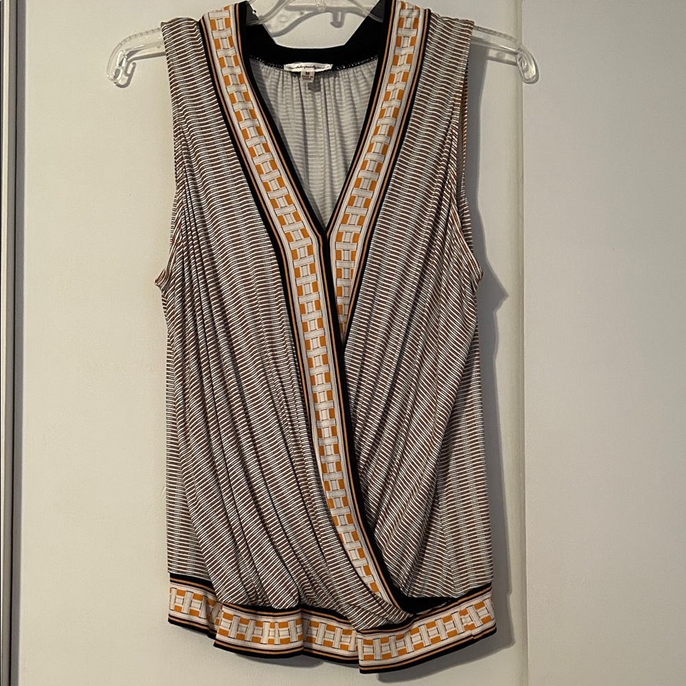 Chic Black and White Sleeveless Blouse with Geometric Trim